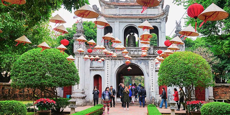 Tourists enjoy the beautiful decorations hanging at the Temple of Literature in Hanoi. 